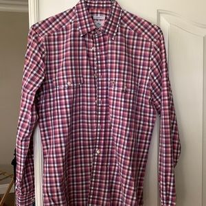 Like new.  Multi color plaid